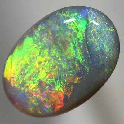 SOLID SEMI BLACK OPAL Quick changing fire, orange to green. Bright. SEE VIDEO